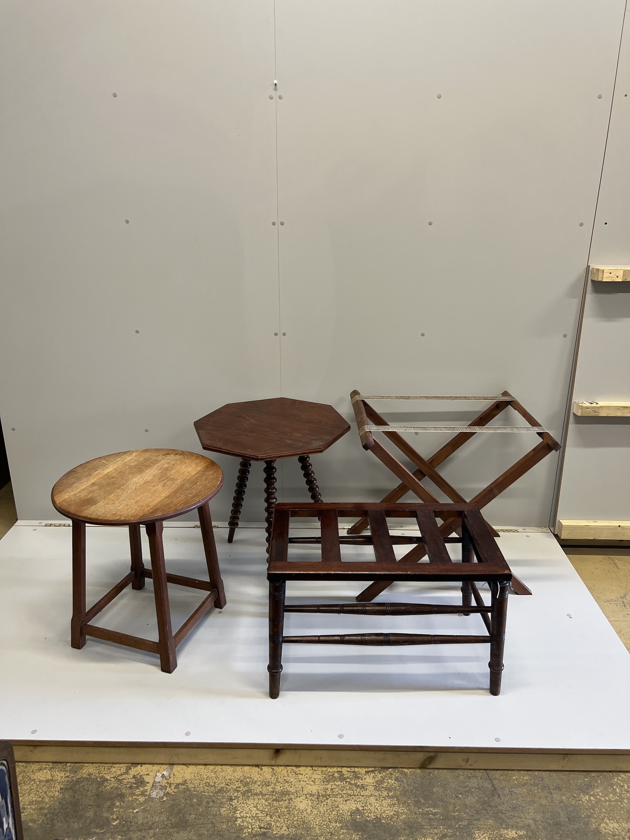 A late Victorian mahogany luggage rack, an octagonal occasional table, a circular oak table, butler's tray stand and an elbow chair